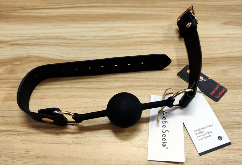 Image showing the ball gag and its tags