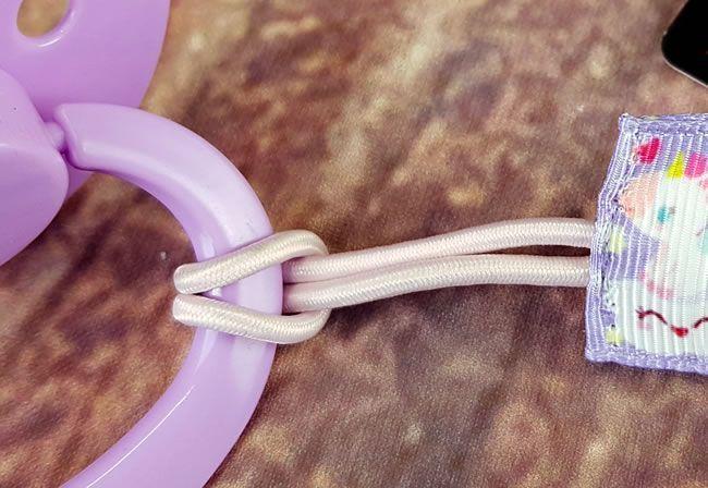 Image showing the elasticated loop fitted to a pacifier
