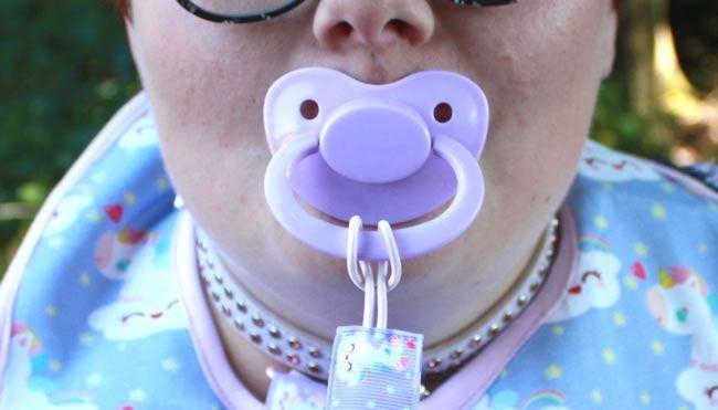 Image showing Little Rae with her purple pacifier