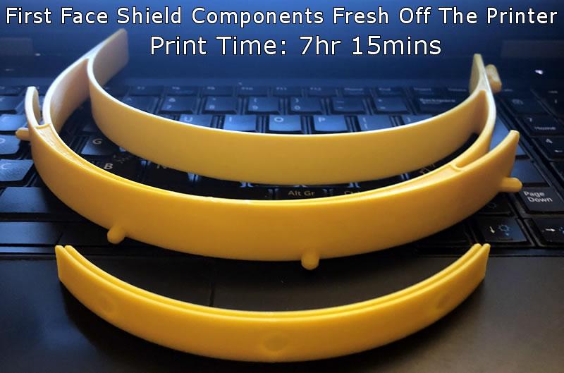 Image showing the first pair of PPE face shield components off my printer bed