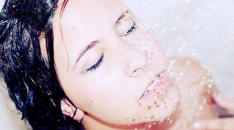 Image showing a woman showering