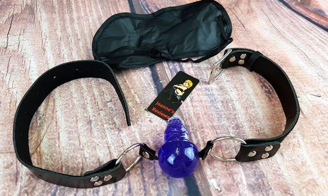 Image showing the ball gag and blindfold laid side by side