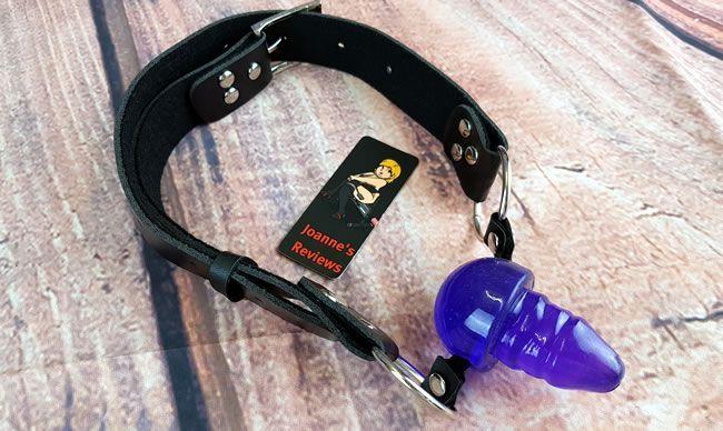 Image showing the penis ball gag with the strap buckled up