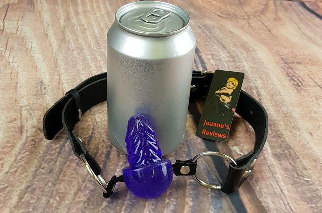 Image showing the penis ball gag with a can of pop as a size comparison