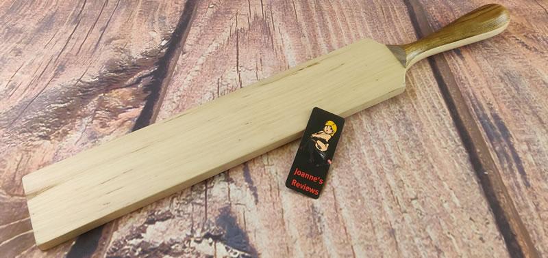 Image showing this delightful wooden paddle from Grateful Pain