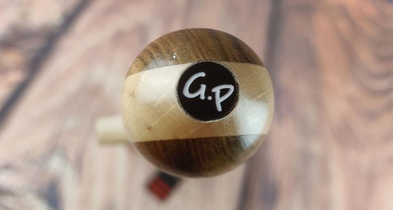 Image showing the Grateful Pain logo in the end of the handle