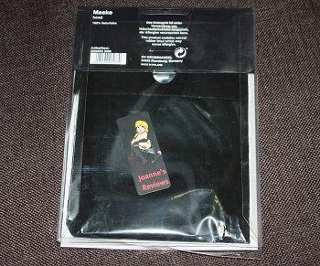This latex mask is inside a black bag within the outer packaging