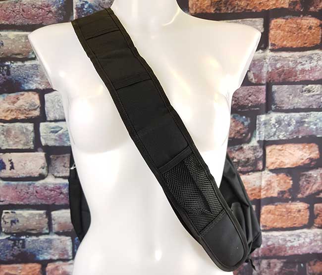 Image showing the shoulder bags chest strap and the mesh pocket