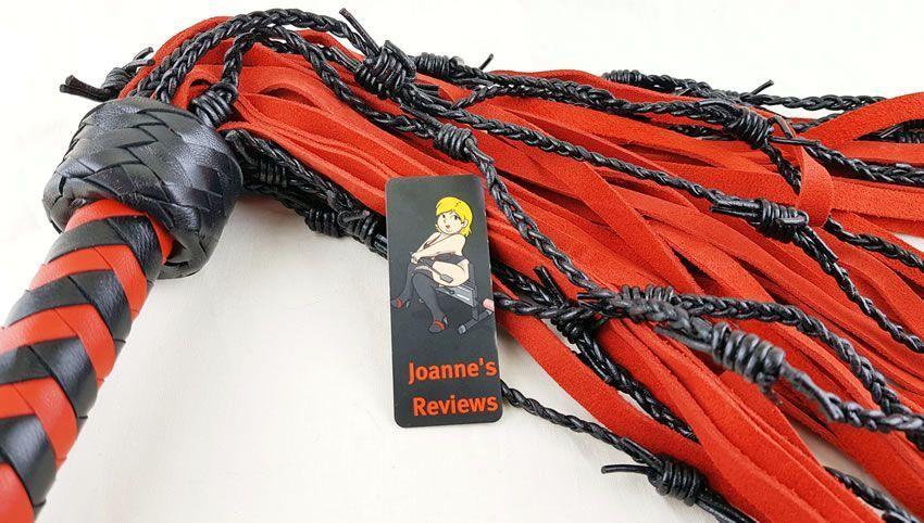 This flogger is sumptuous and also thretening with its black barbs