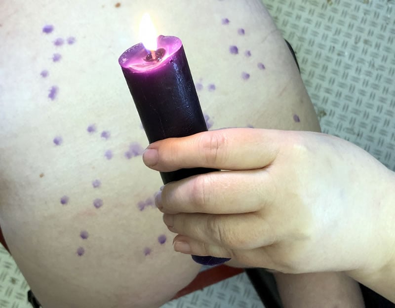 Image showing the candle dripping wax onto sub'r'