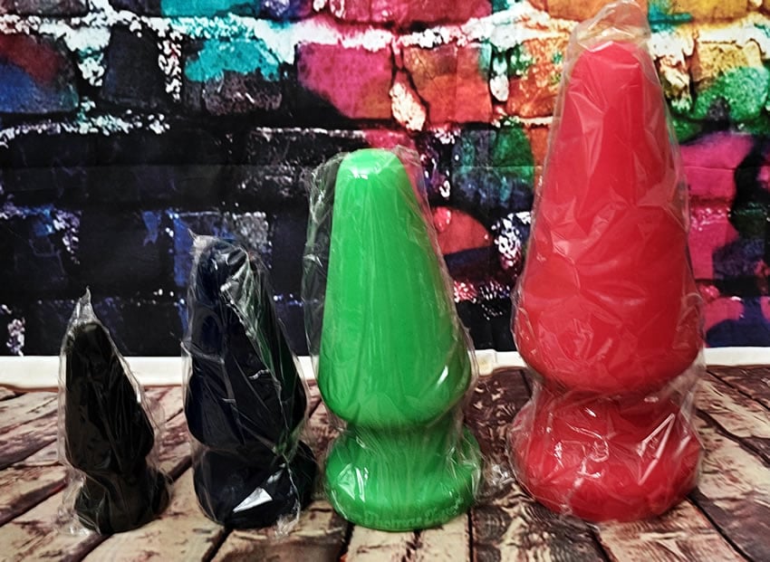 Image showing all four sizes and colours of RHINO in their packaging film