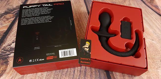 Image showing the opened retail packaging of the Titus Puppy Tail Pro Butt Plug