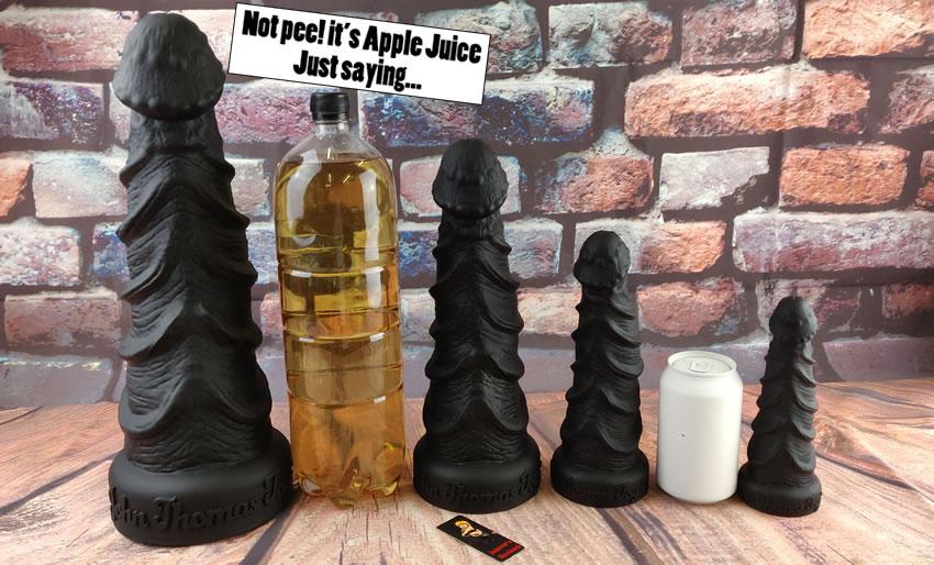 Image showing the Beastli dildos with a can and bottle for comparison