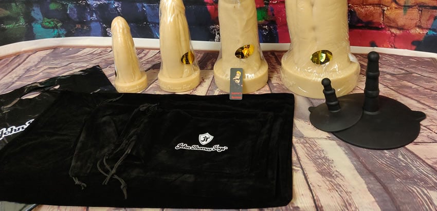 Image showing the storage bags and suction cup adaptor you get with Daddy's Cock