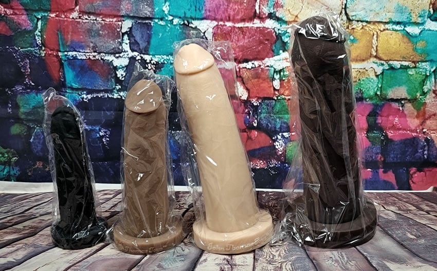 Image showing all four sizes of Inmate in their minimalistic packaging