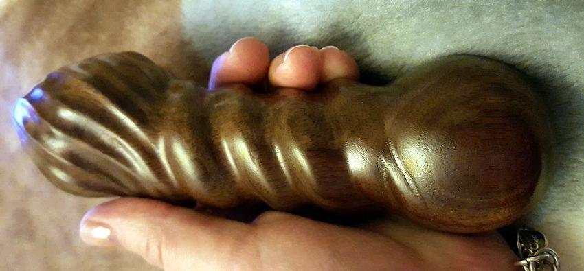 This dildo is a stunning colour and is made out of Walnut