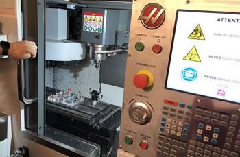 Image showing one of the E-Stim Systems CNC lathes used to produce their electrodes