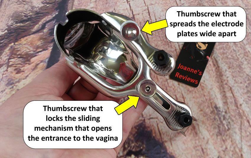 Image showing the thumscrews on the Electro Speculum that are used to open it after insertion