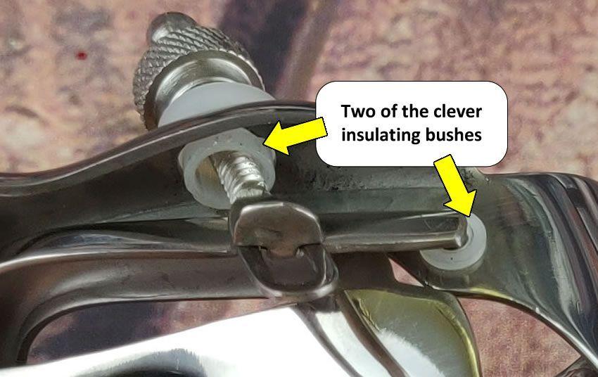 Image showing two of the insulating bushes on the Electro Speculum that are used to electricaly isolate the components