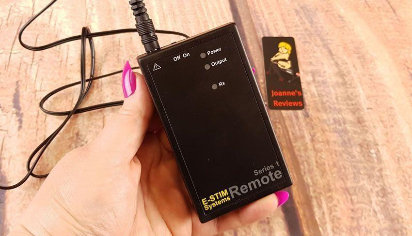 Image showing the E-Stim Remote System with the cable plugged in