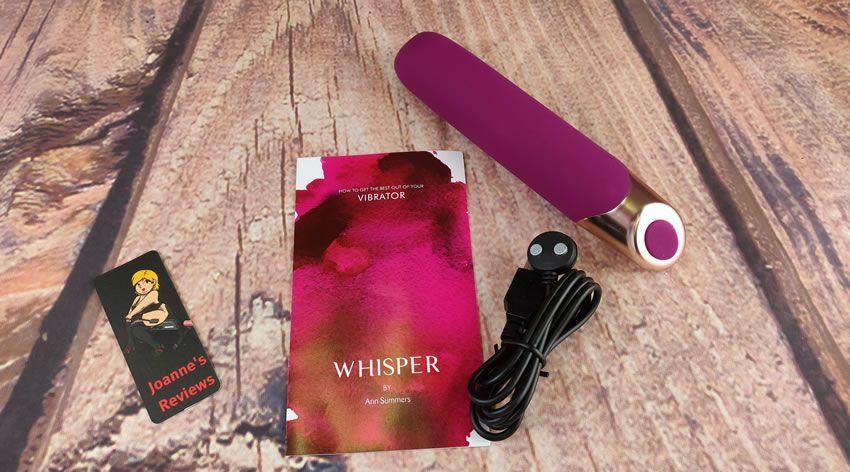 Image showing the Whisper Vibe, charging cable and instructions