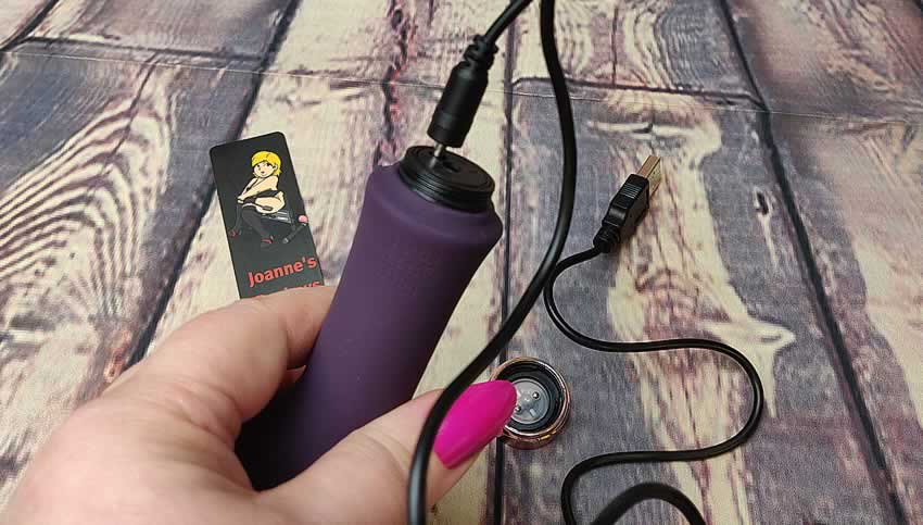 Image showing the charging cable fitted into the base of the Lavish Attention vibe