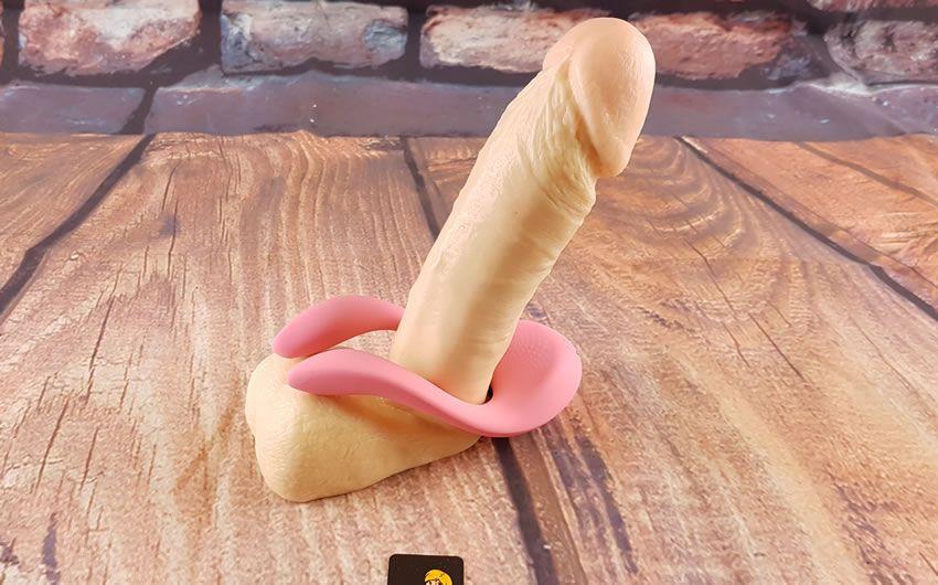 Images showing the Multifun 2 wrapped around a dildo